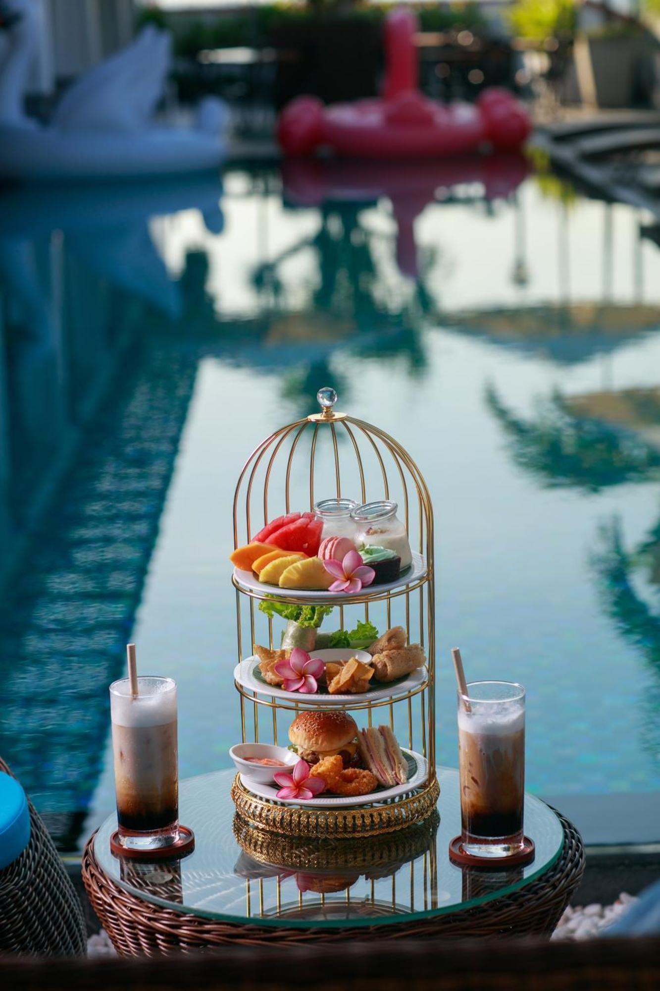 Grand Sunrise Palace Hoi An- A Luxury Indochine Hotel & Spa Exterior foto Afternoon tea at the Royal Mirage
